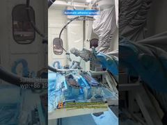 Автоматизированное распыление клея как процесс предварительного ламинирования для компонентов интерьера автомобилей